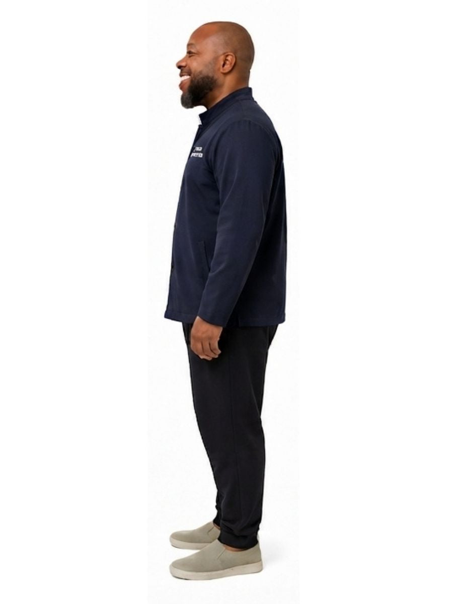 Adult wearing QUPPL weighted jacket in dark navy color showing side view.