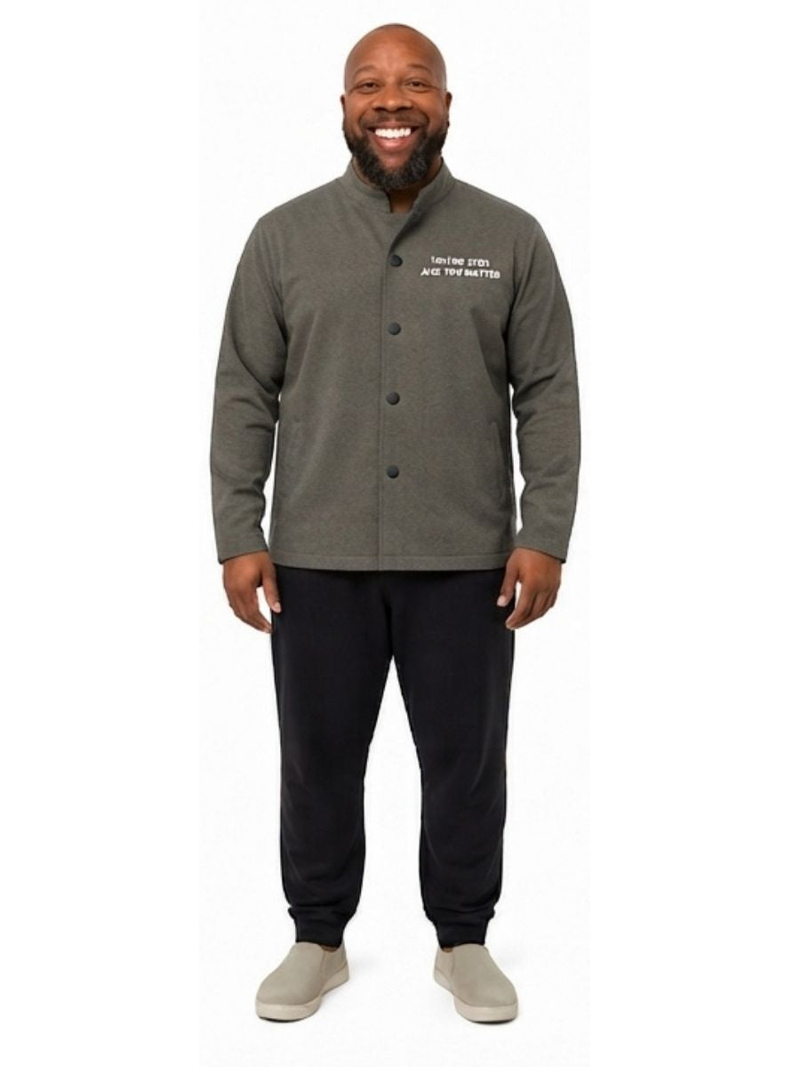 Adult wearing QUPPL weighted jacket in charcoal grey color showing front view.