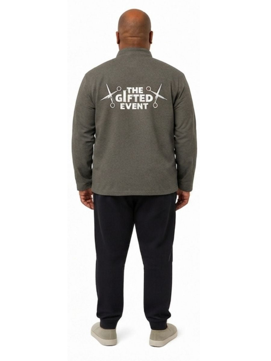 Adult wearing QUPPL weighted jacket in charcoal grey color showing back view.
