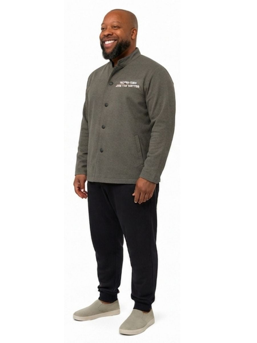 Adult wearing QUPPL weighted jacket in charcoal grey color showing 45 degree view.