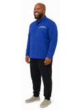 Adult wearing QUPPL weighted jacket in royal blue color showing 45 degree view.